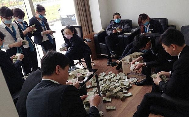 Chinese woman buys new BMW with small change, employees count for six hours